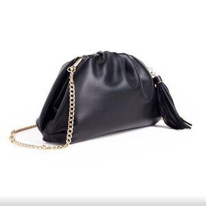 Understated Leather black clutch bag. Curateur. With gold chain strap. New.